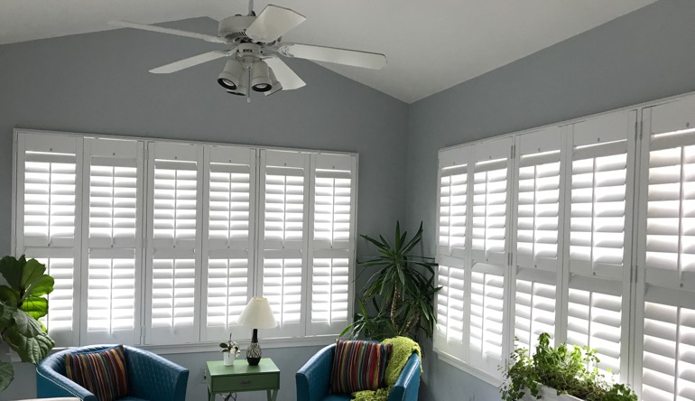 Fort Lauderdale sunroom with fan and shutters